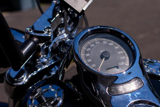 A Shiny Silver Chrome Speedometer on a Motorcycle
