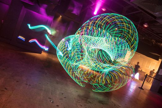 Abstract art of light painting timed exposure vibrant neon colors