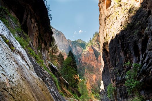 The Narrows hiking at Zion National Park Utah.