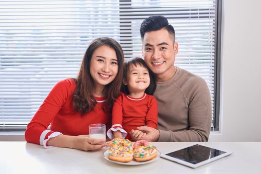 happy family has breakfast in the morning