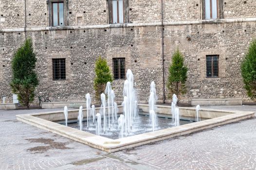 new restored fountain in piazza europa under the town hall