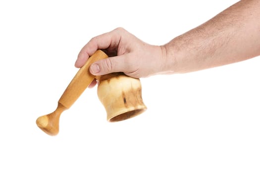 Hand holds a wooden mortar on a white background, template for designers.