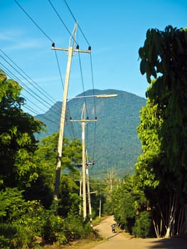 small road to the mountain in the countryside