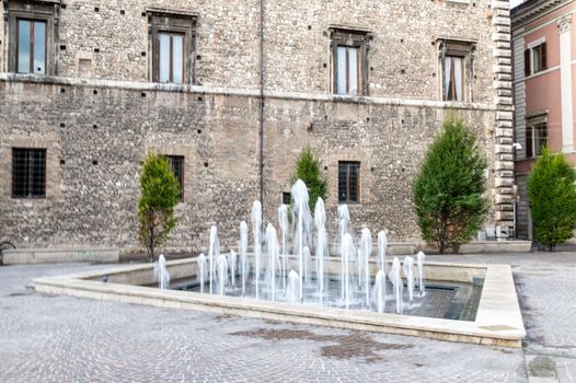 new restored fountain in piazza europa under the town hall