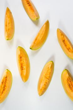 split cantaloupe cut into small pieces and place orderly 