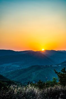 Sunset in Caucasus mountain as a wild nature landscape
