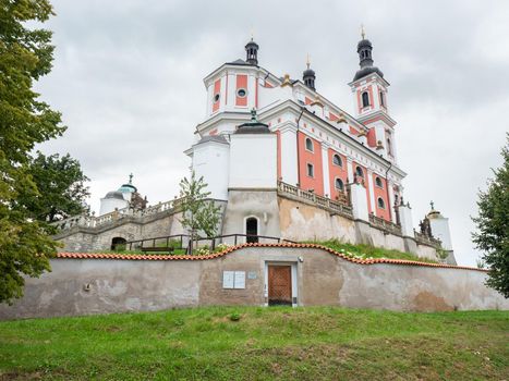 Baroque  church in Luze Kosumberk, Czech Republic. Cloudy rainy sky.