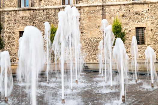 new restored fountain in piazza europa under the town hall