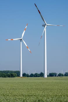 Modern wind turbines seen in rural Germany
