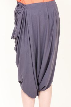 Closeup shot of woman wearing trendy fashion skirt