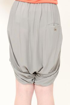 Closeup shot of woman wearing trendy fashion skirt