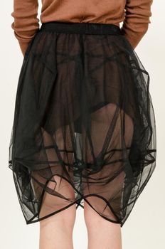 Closeup shot of woman wearing trendy fashion skirt