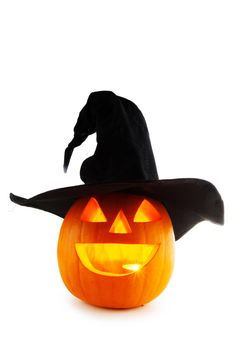 Jack O Lantern Halloween funny pumpkin with carved smiling face with witches hat isolated on white background