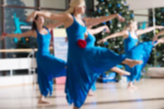 Dance class for women at fitness centre abstract blur background