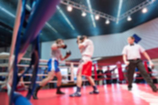 Boxing match abstract blur sports background with bokeh