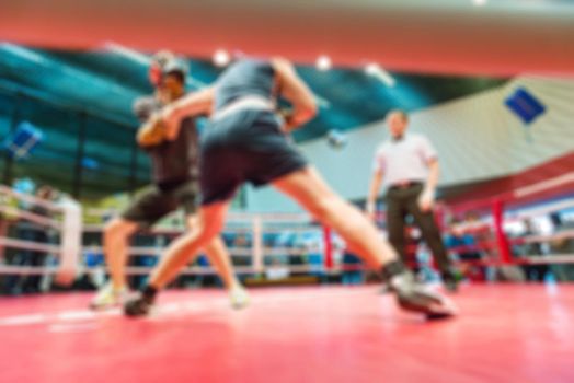 Boxing match abstract blur sports background with bokeh