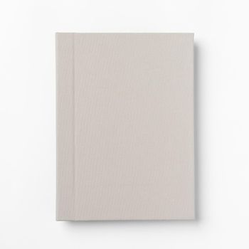 Grey hardcover book, isolated on white background. Top view