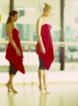 Dance class for women at fitness centre abstract blur background