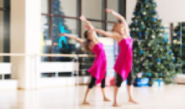 Dance class for women at fitness centre abstract blur background