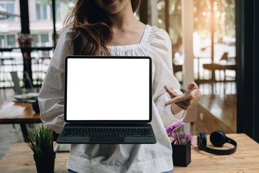 business woman holding digital tablet. Blank screen for your advertising.