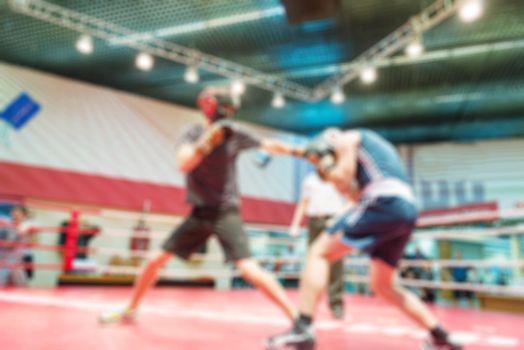 Boxing match abstract blur sports background with bokeh