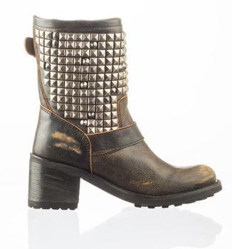 Modern fashionable women winter boot shot in studio
