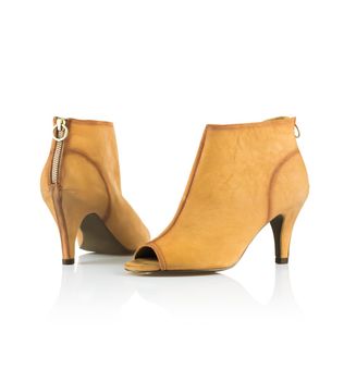 Pair of modern fashionable women shoes shot in studio
