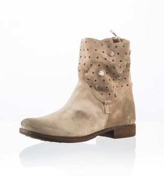 Modern fashionable men winter boot shot in studio