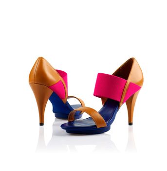Pair of modern fashionable women shoes shot in studio