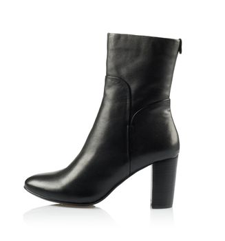 Modern fashionable women winter boot shot in studio