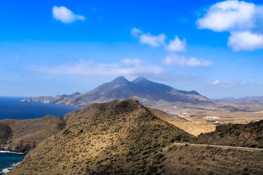 Beautiful seascape in Isleta del Moro village. Volcanous in the background.