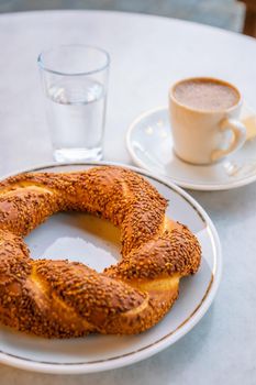Turkish traditional bagel simit with Turkish coffee in Istanbul, Turkey