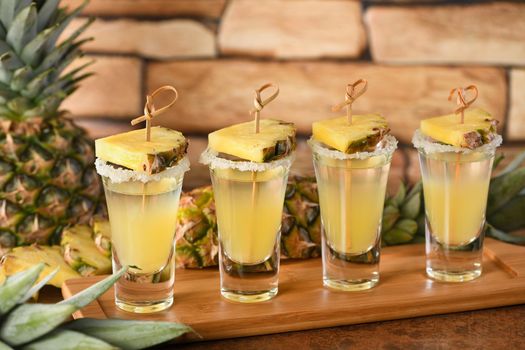 Double shots of tropical tequila with pineapple juice. This is definitely going to be a great party for Cinco de Mayo!