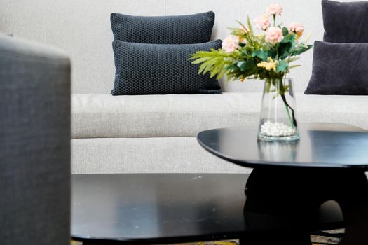 Pink Flower vase on table decoration in living room.