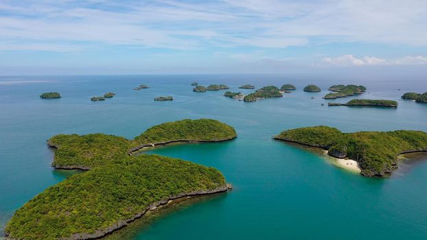Top view of the beautiful Islands with lagoons and beaches in the hundred Islands national Park, Pangasinan, Philippines. Summer and travel vacation concept