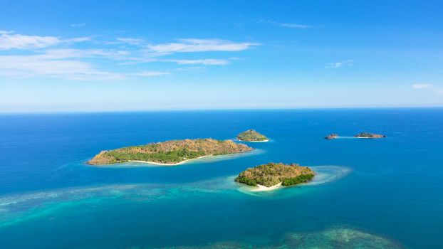 Tropical landscape: islands with beautiful sandy beaches by turquoise water view from above. Zamboanga Peninsula. Sallangan Islands, Simoadang Island. Mindanao, Philippines.