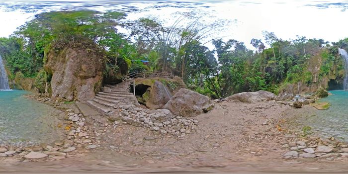 360VR: Inambakan waterfalls in a mountain gorge in the tropical jungle, Philippines, Cebu. Waterfall in the tropical forest.
