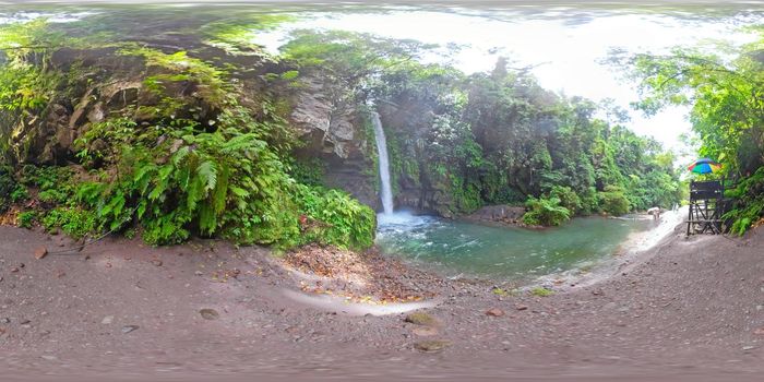 Waterfall in green rainforest 360VR. Tropical Tuasan Falls in mountain jungle. waterfall in the tropical forest. Camiguin, Philippines, Mindanao