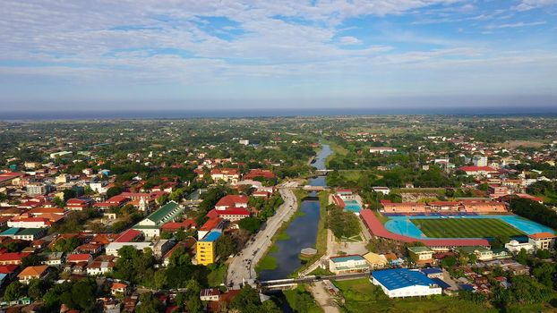 Vigan city in sunny weather, aerial view. Landscape with streets and houses. Historic buildings in Vigan city, Unesko world heritage site. Travel concept.