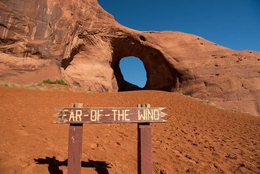 Giant sized hole in rock face at Ear-of-the-Wind arch