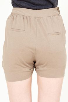Young woman wearing sexy fashion short pants closeup shot