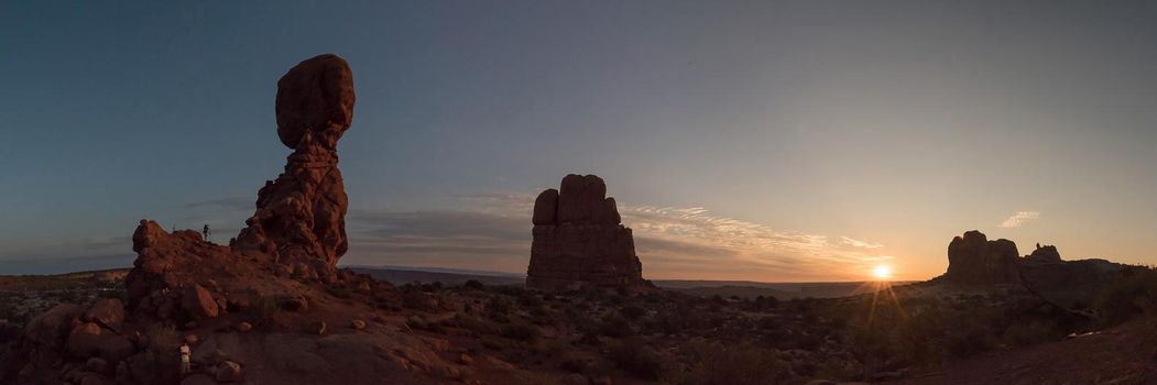 Utah Panorama of balanced rock and mesa rock at sunset Arches National Park