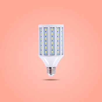 LED energy saving lamp 230v isolated on orange pastel color background