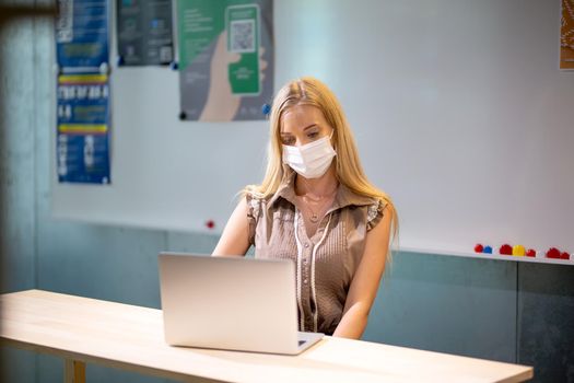 Beautiful young woman working using computer laptop concentrated and smiling