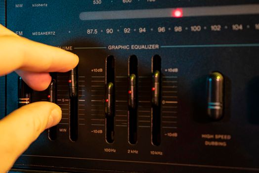 Volume and equalizer controller detail in an old stereo equipment