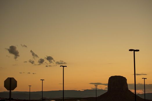 Navajo Nations Monument Valley Park juxtaposition mesa with stop sign