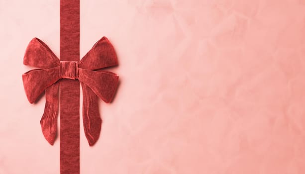 red velvet ribbon on paper surface with space for text in Christmas gift concept. 3d rendering