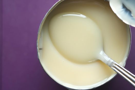 condensed milk in a bowl close up