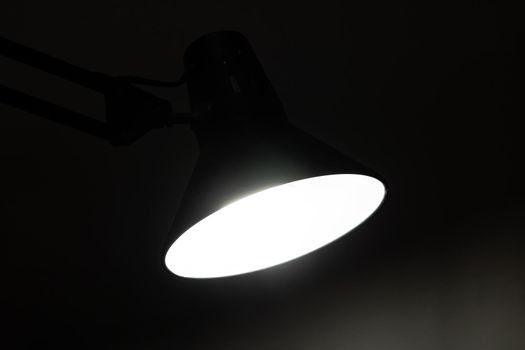Table lamp light in the dark close up