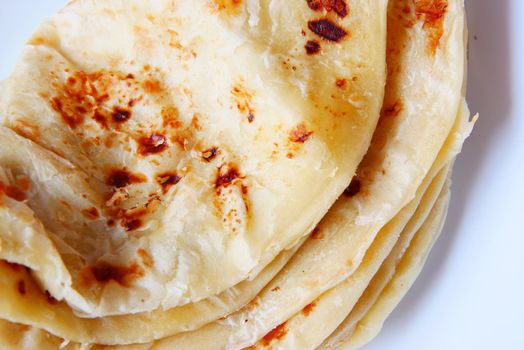 homemade roti chapati on table .,